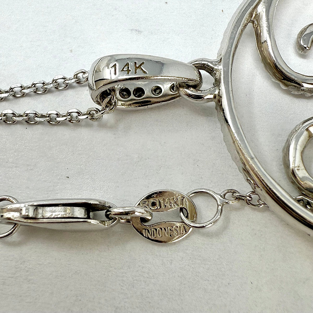 14K White Gold Diamond Swirl Pendant Necklace