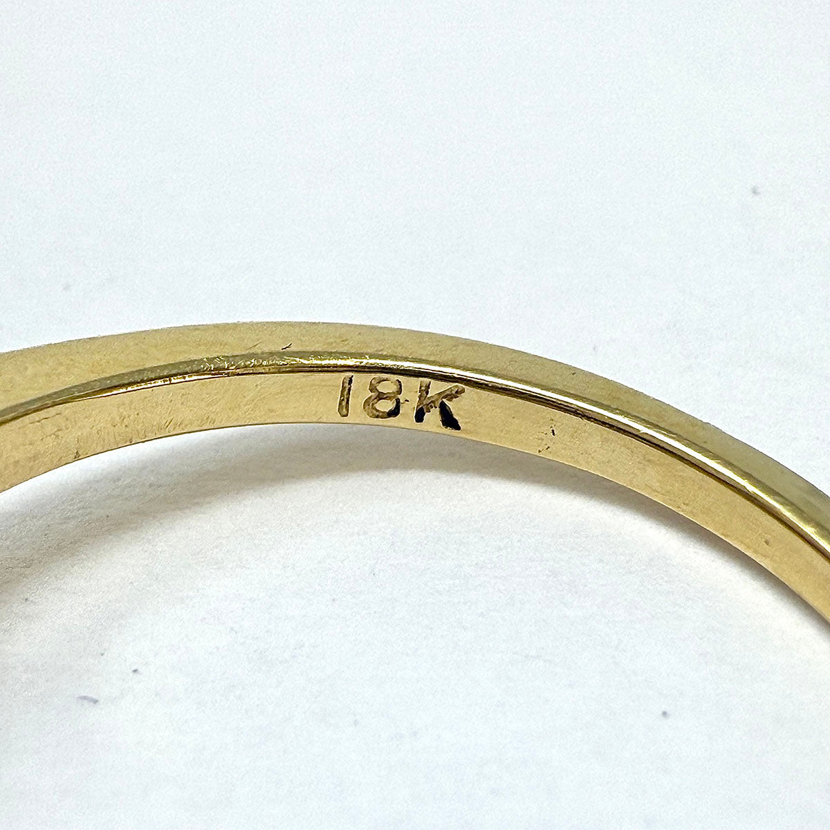 18K Gold Wavy Ring with 6 Emeralds and 5 Marquise Diamonds