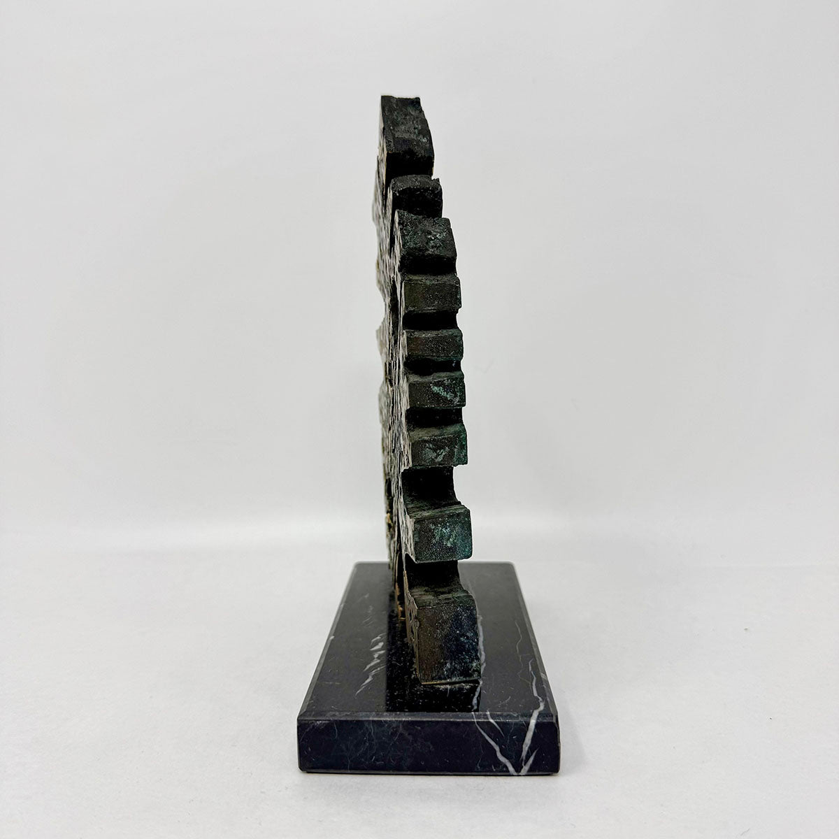 Brutalist Sculpture on a Marble Stand