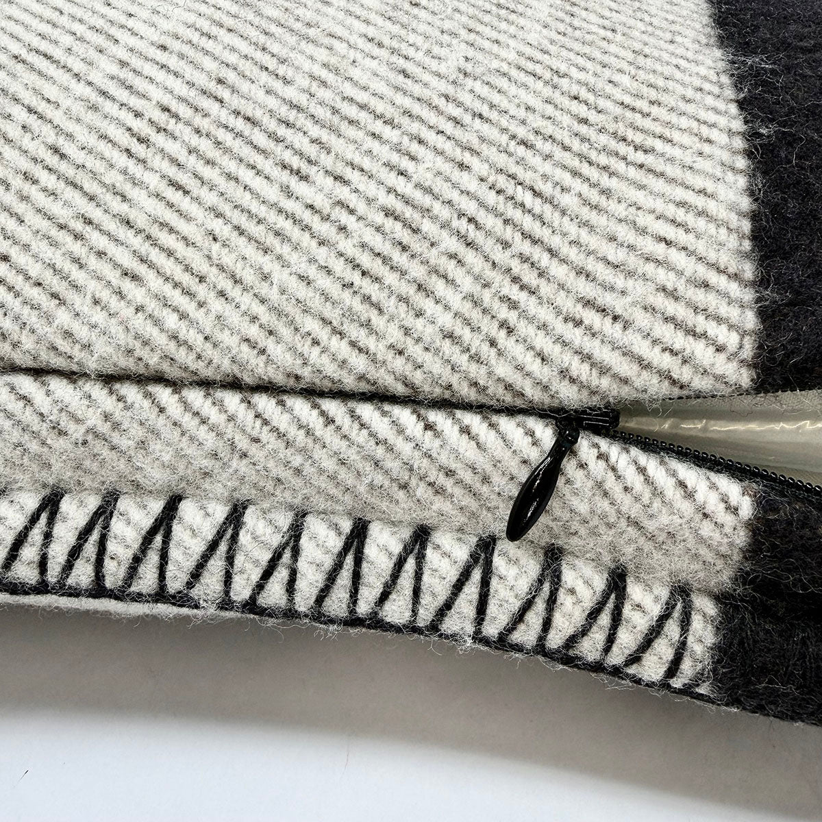 Hermes Avalon III Pillow Finished with Blanket Stitch