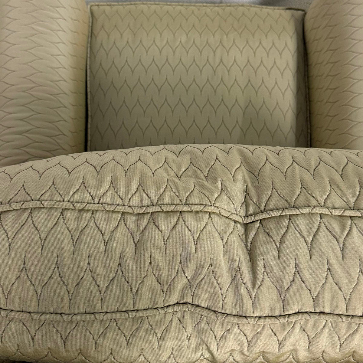 Beige Upholstered Armchair with Matching Ottoman