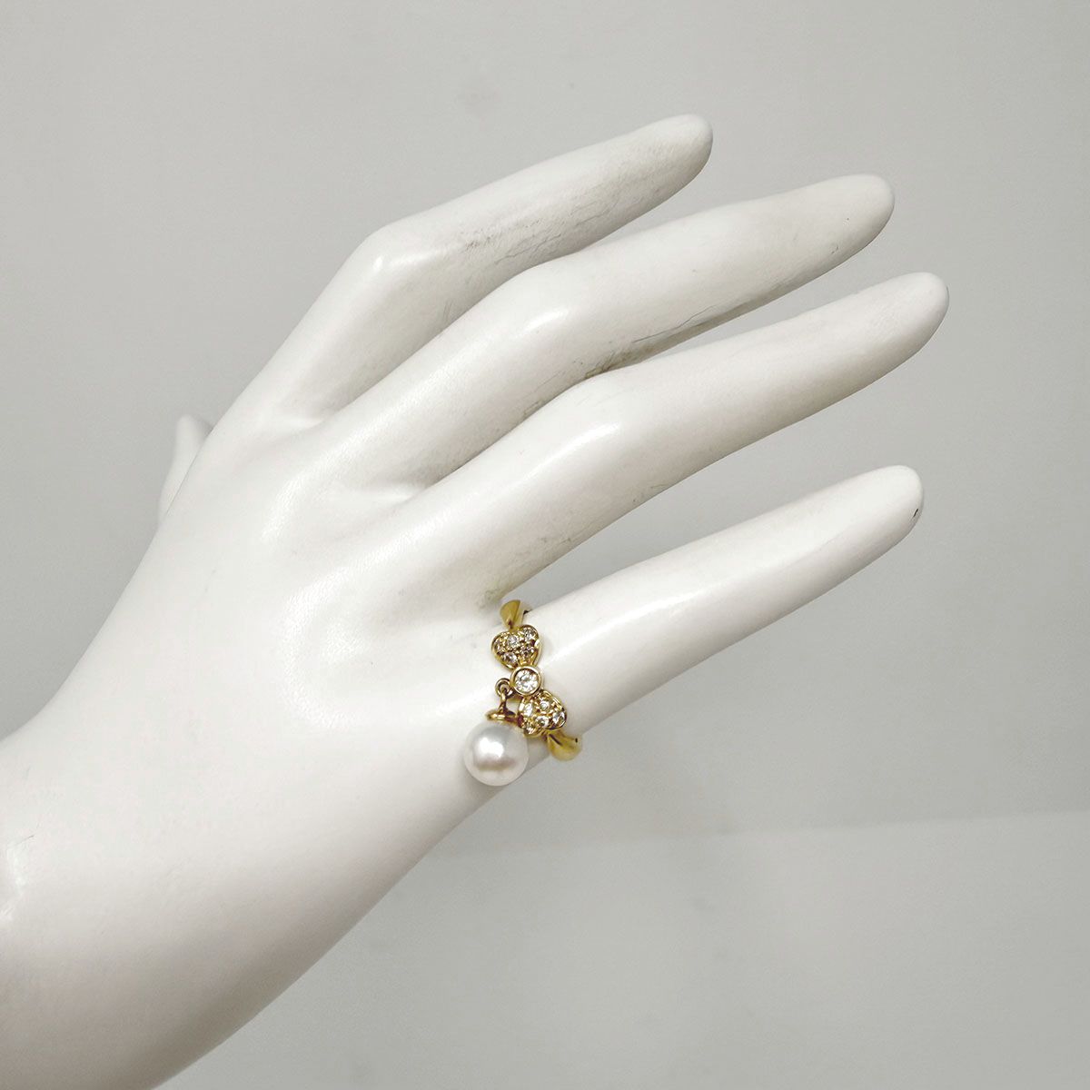 Bow Ring with Diamonds and Pearl