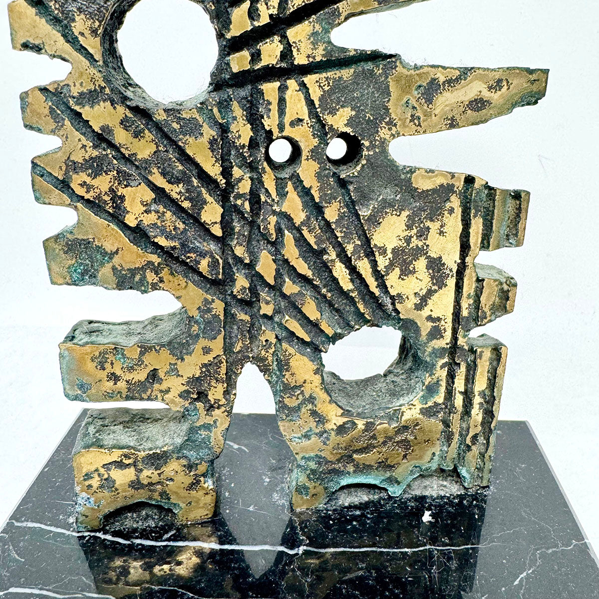 Brutalist Sculpture on a Marble Stand