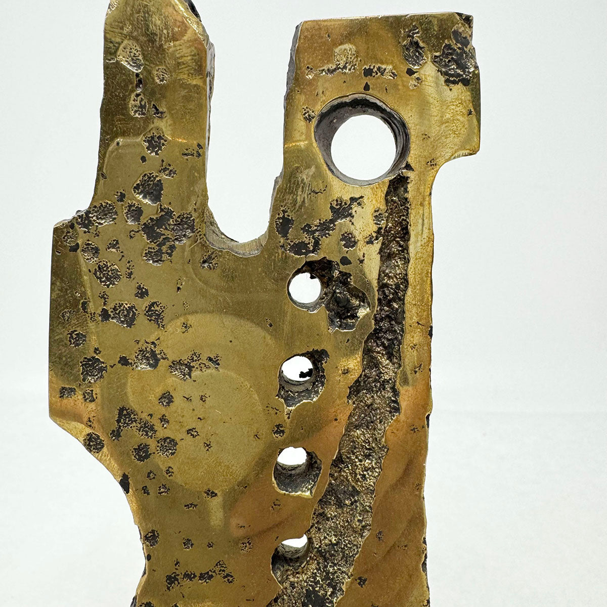 Brutalist Sculpture on a Marble Stand
