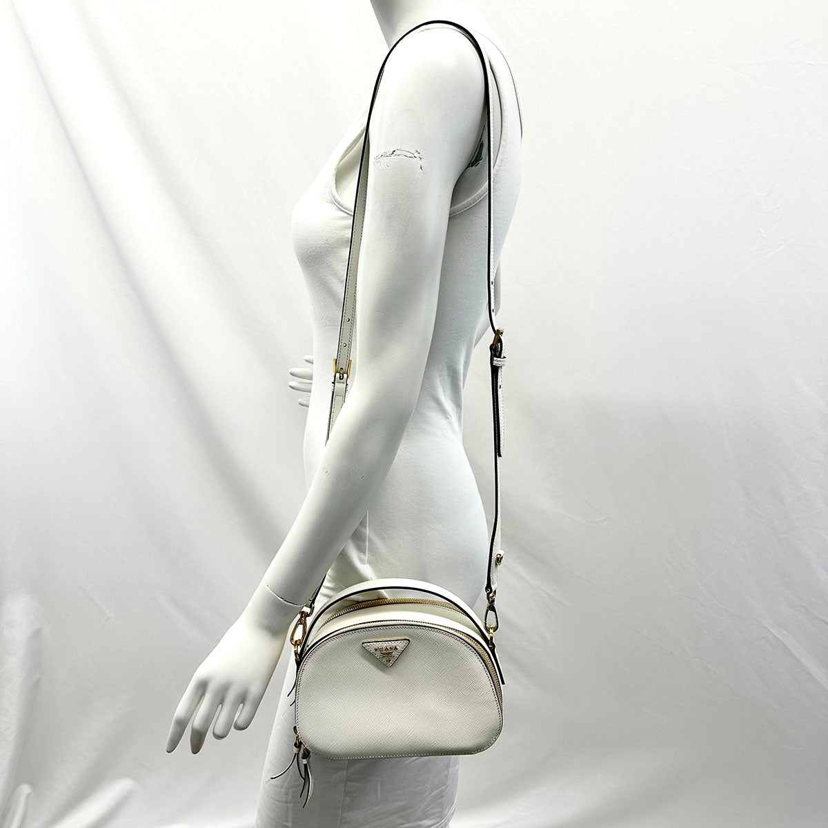 Prada Enameled Metal Triangle Odette Crossbody