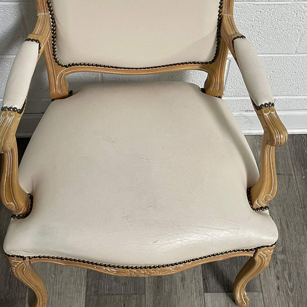 Pair of French-Style Leather Chairs With Nail Head Accents