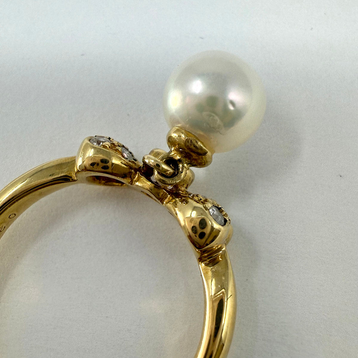Bow Ring with Diamonds and Pearl