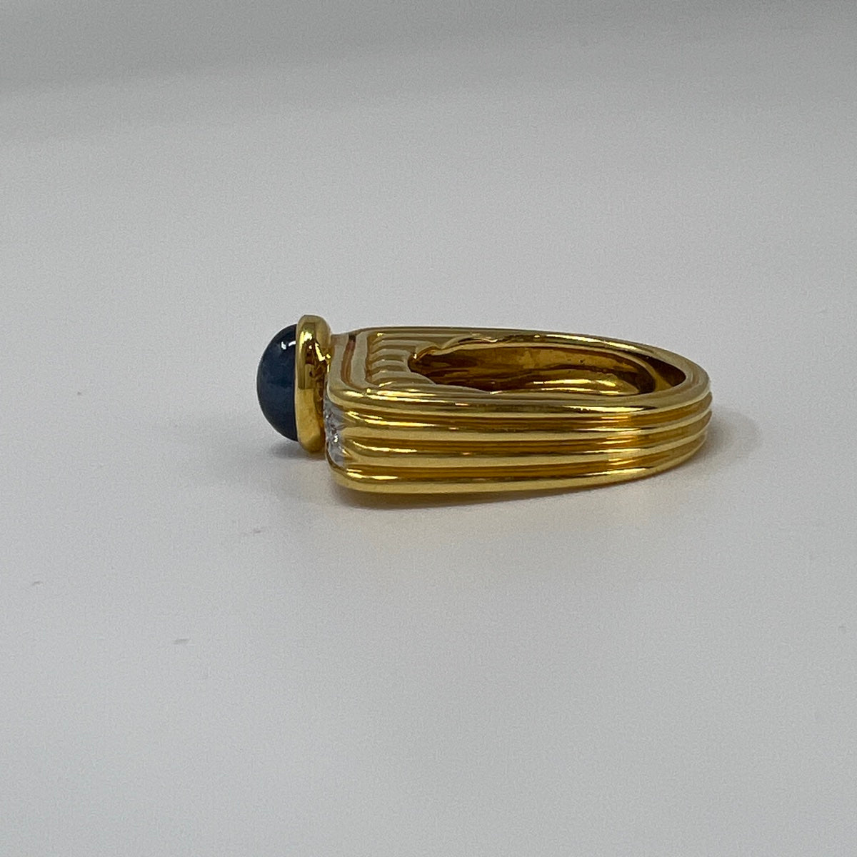 18K Ring with Oval Cabochon Sapphire and Diamonds