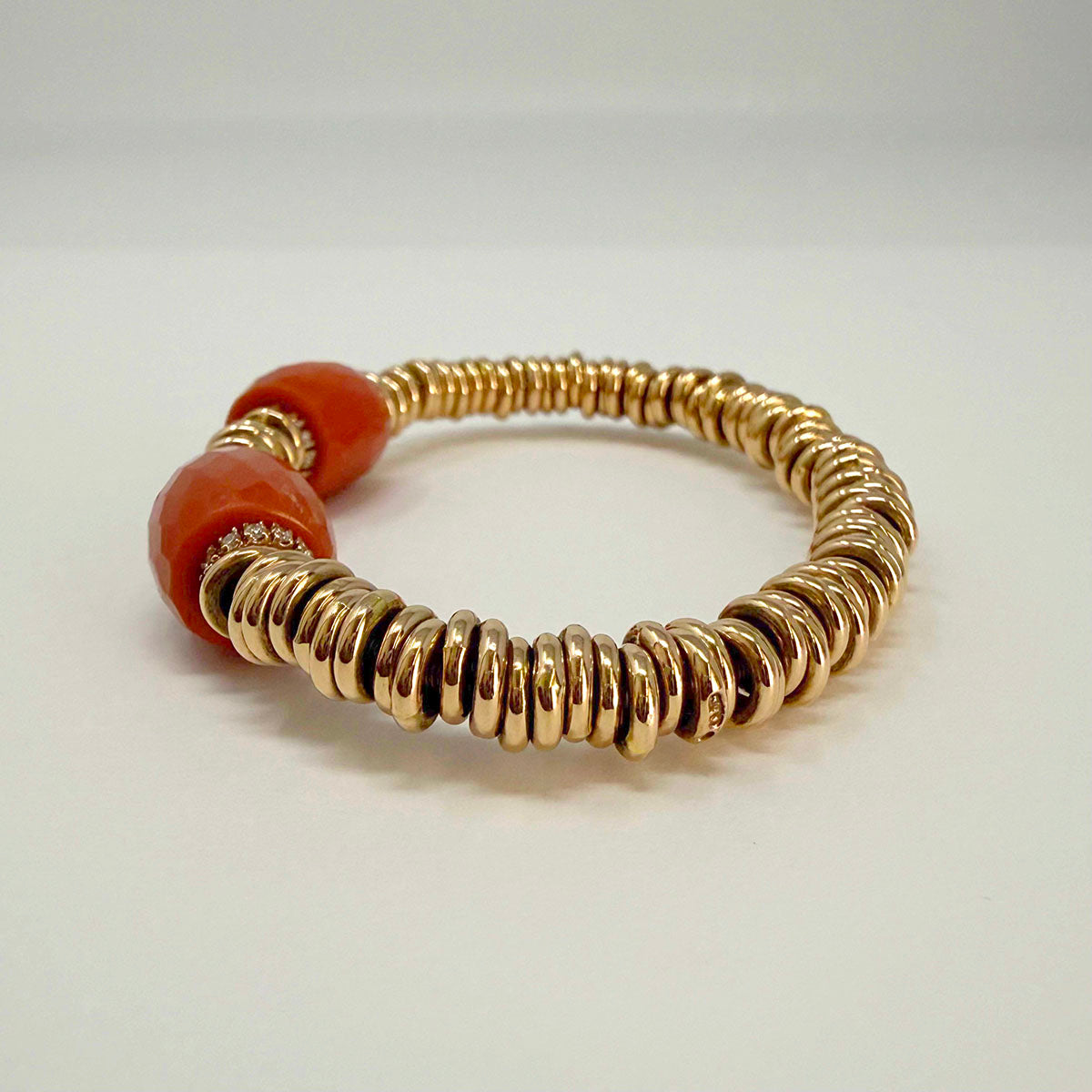 18K Rose Gold Diamond Stretch Bracelet with 4 Diamond Rondels and 2 Corals