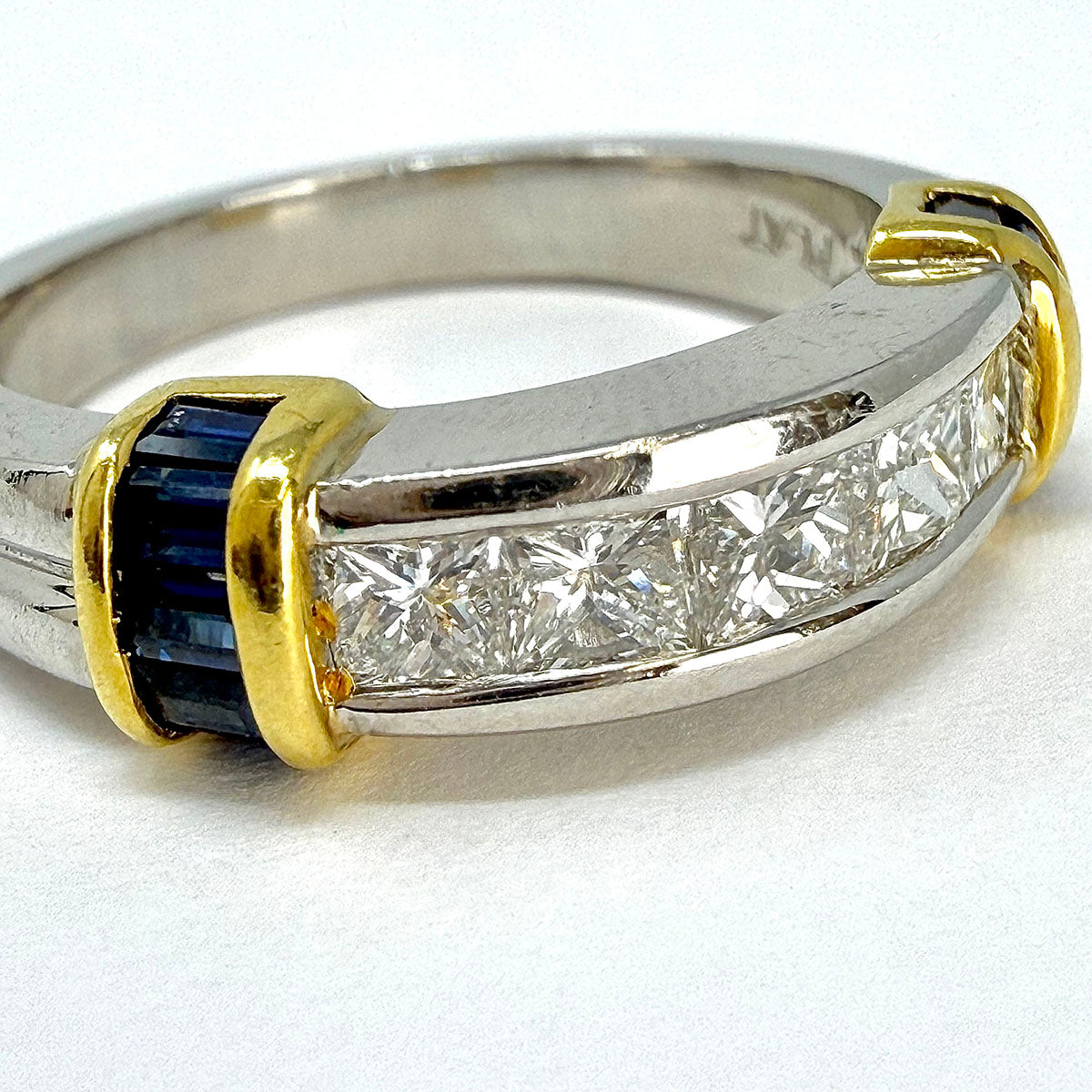 Platinum and 18K Gold Ring with 5 Diamonds and 18 Baguette Sapphires
