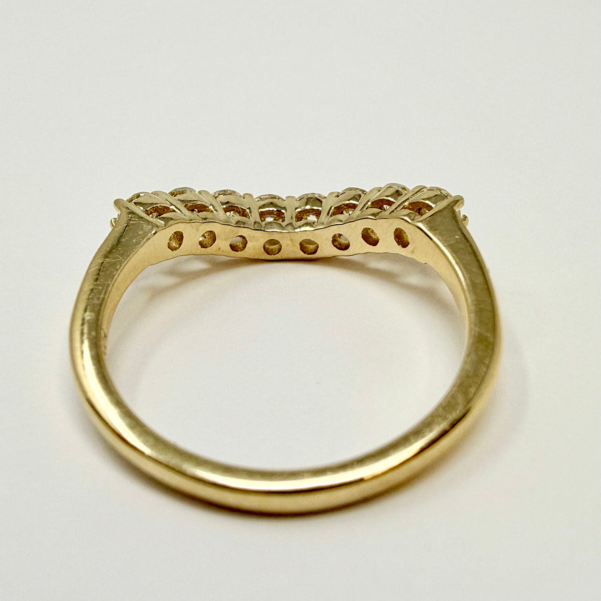 14K Gold Curved Ring with 8 Diamonds