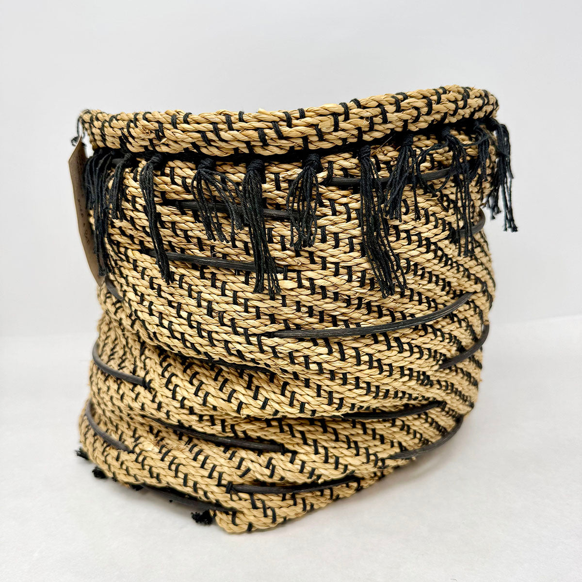 Loomwoven Seagrass Basket adorned with Sandstone
