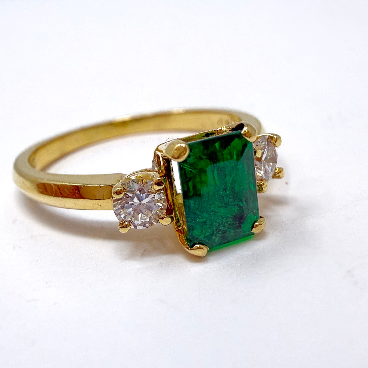 18K Gold Ring with Prong Set Emerald and 2 Diamonds
