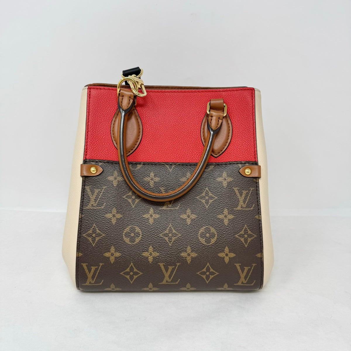 Louis Vuitton Fold  Tote Monogram and Leather PM