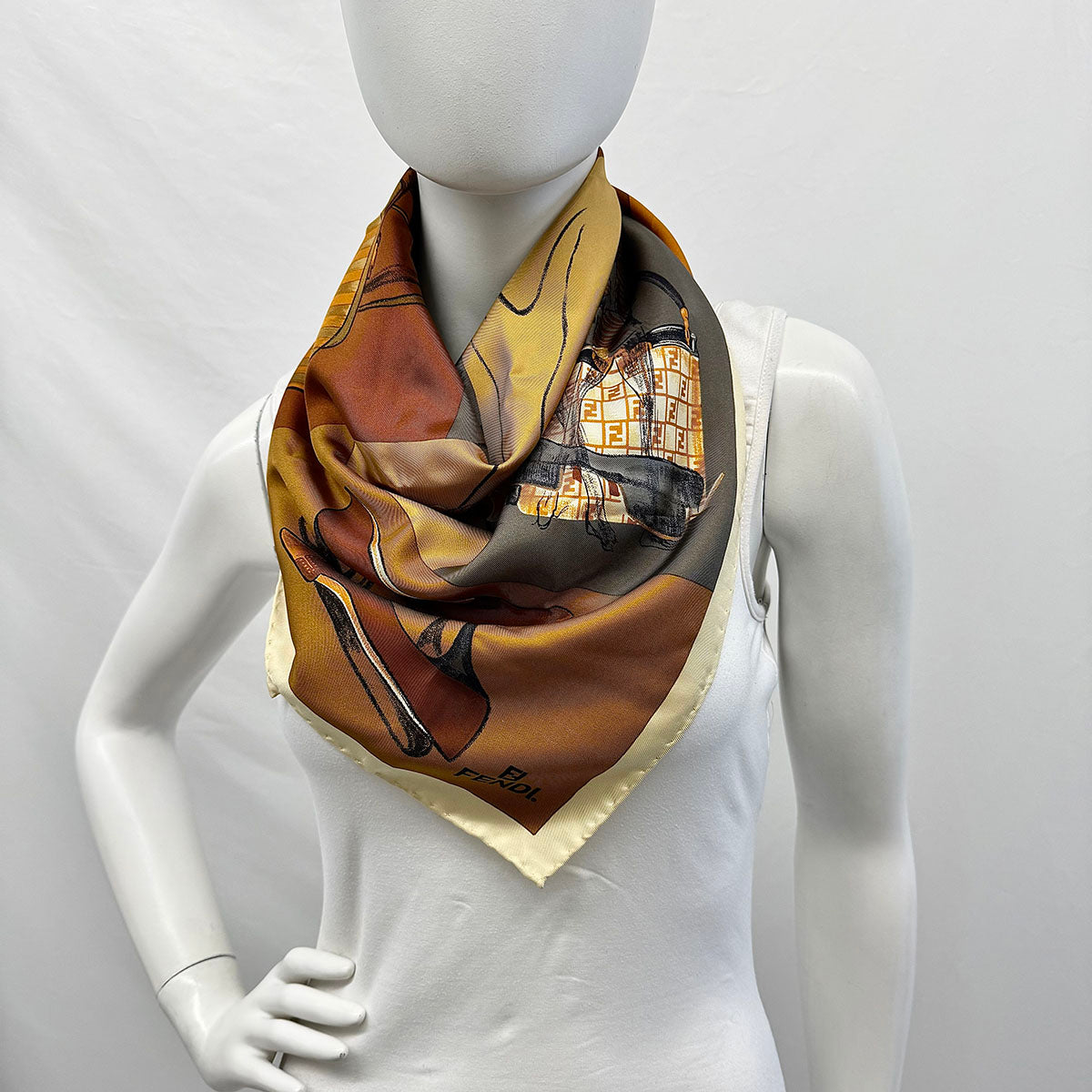 Fendi Scarf Featuring a Collage of Fendi Elements