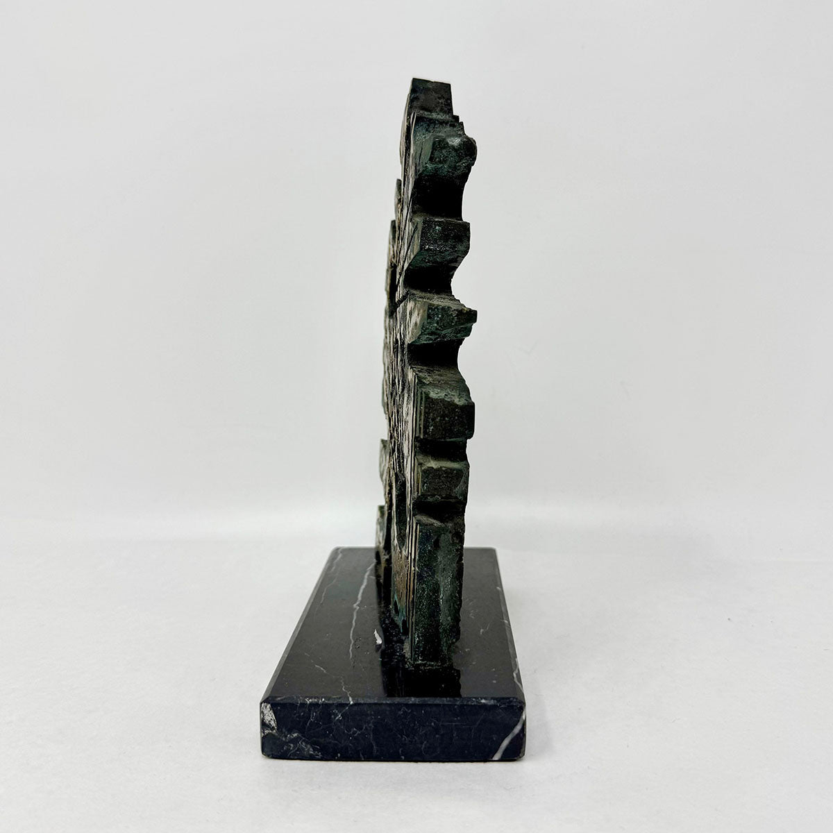 Brutalist Sculpture on a Marble Stand