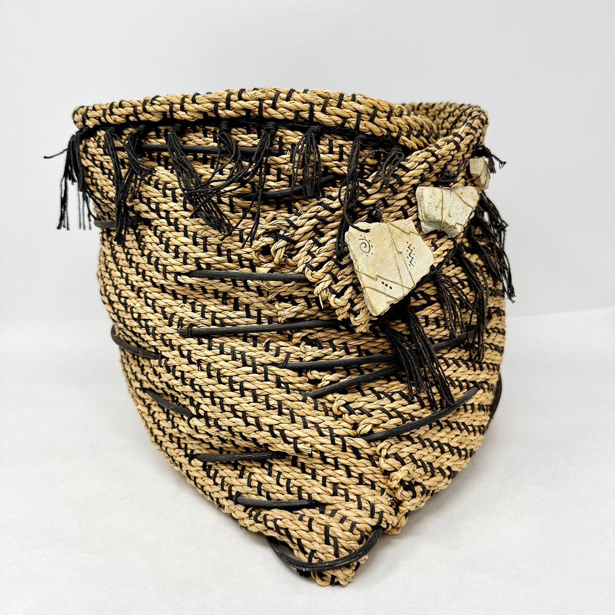 Loomwoven Seagrass Basket adorned with Sandstone