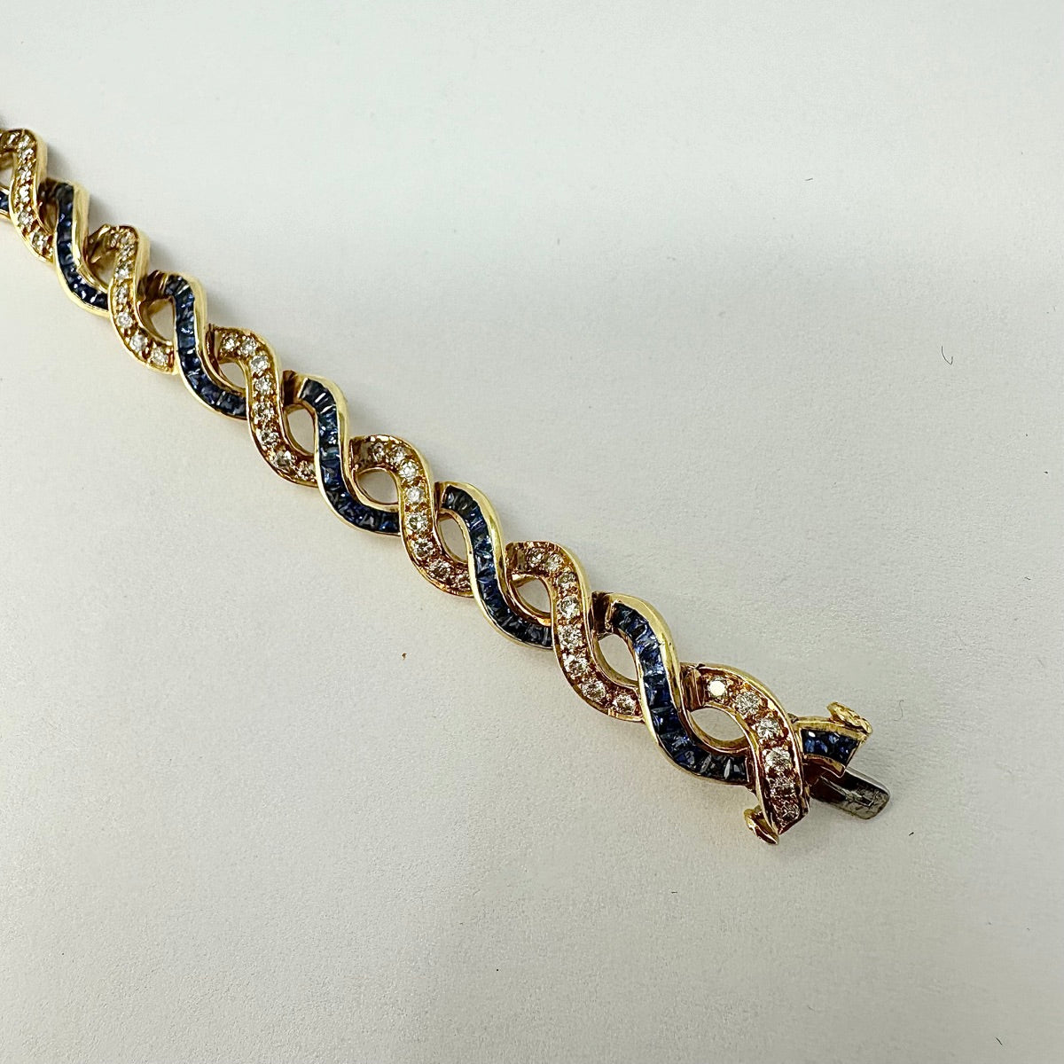 18K Gold Twist 5.25ct Sapphire and 1.54ct. Diamond Tennis Bracelet