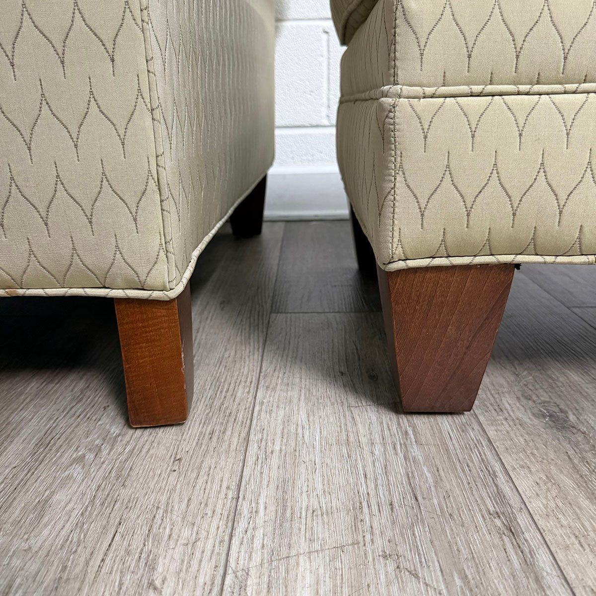 Beige Upholstered Armchair with Matching Ottoman