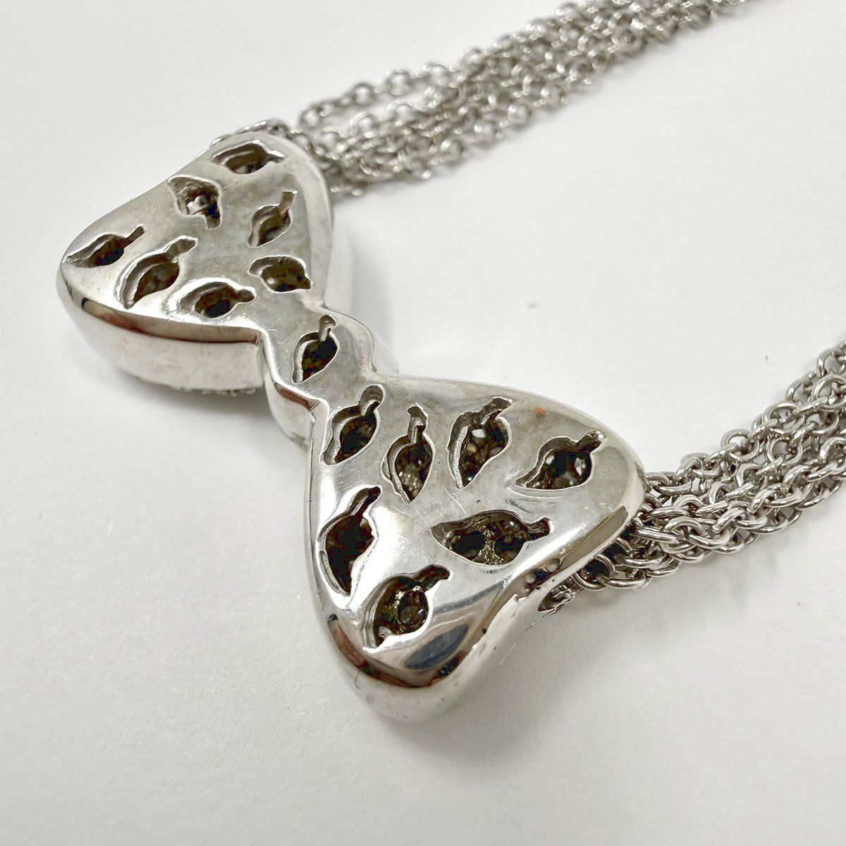 18K White Gold Six Chain Necklace with Diamond Bowtie