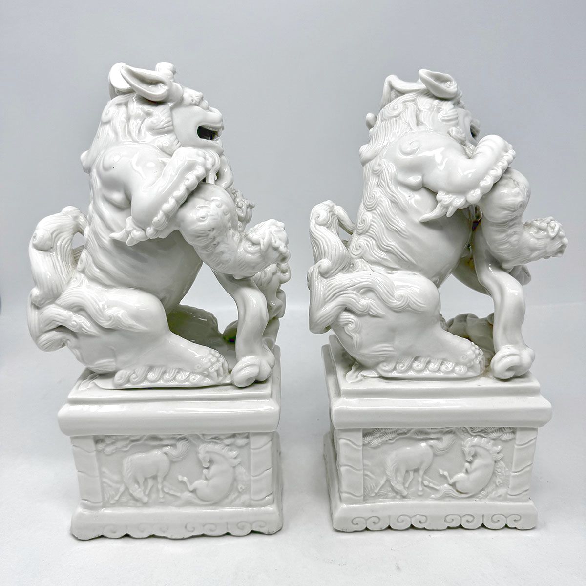 Pair of  Blanc de Chine Foo Dogs/Lions