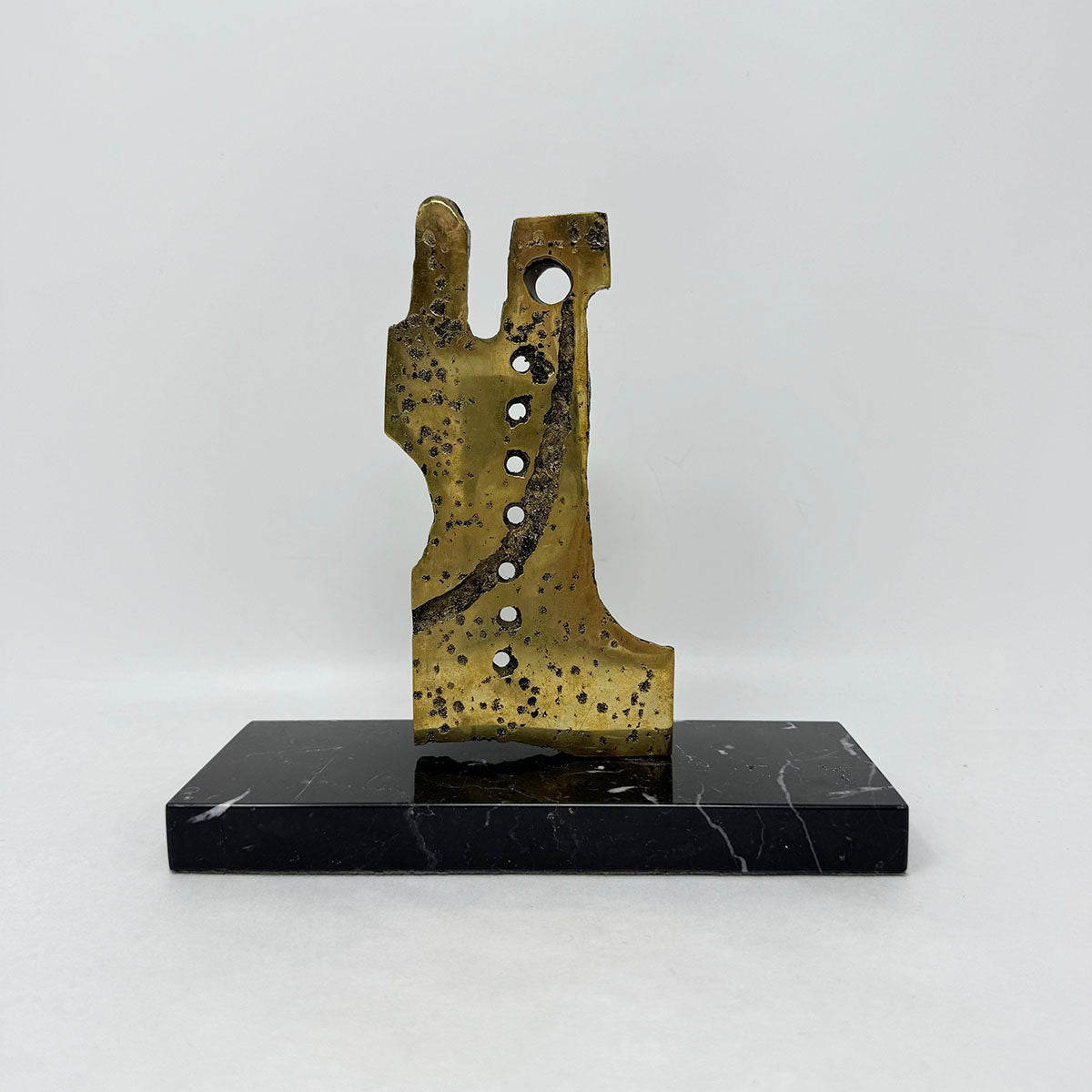 Brutalist Sculpture on a Marble Stand