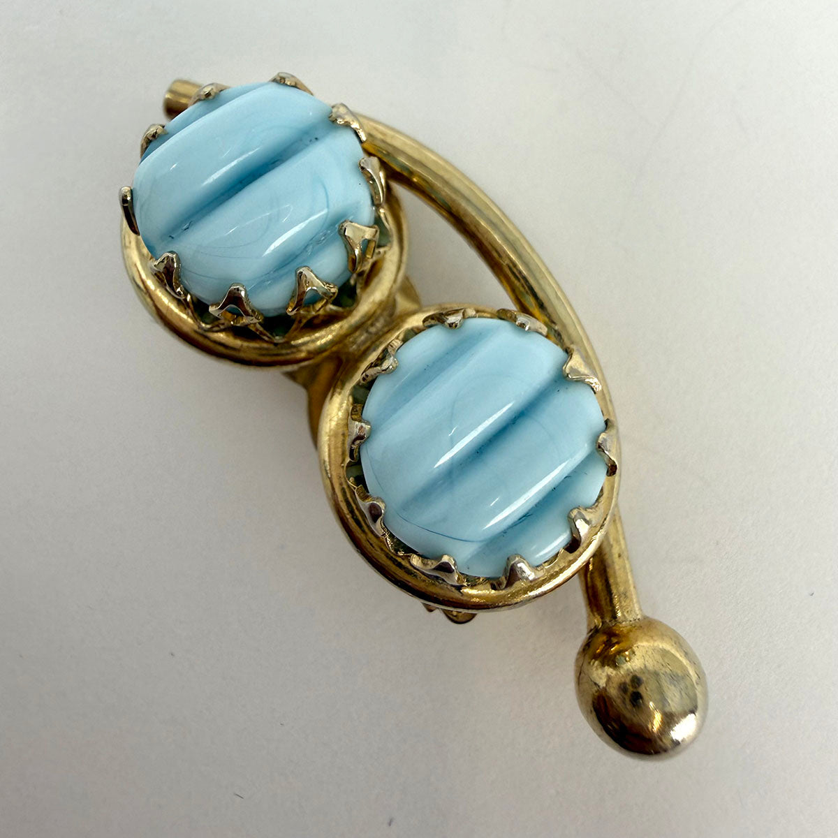 Signed Schiaparelli Clip-on Earrings with 2 Ribbed Stones