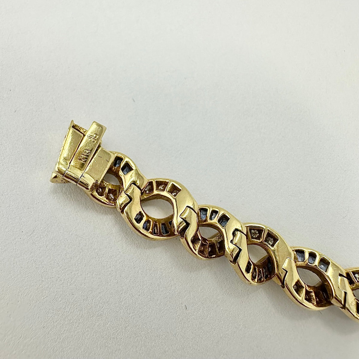 18K Gold Twist 5.25ct Sapphire and 1.54ct. Diamond Tennis Bracelet