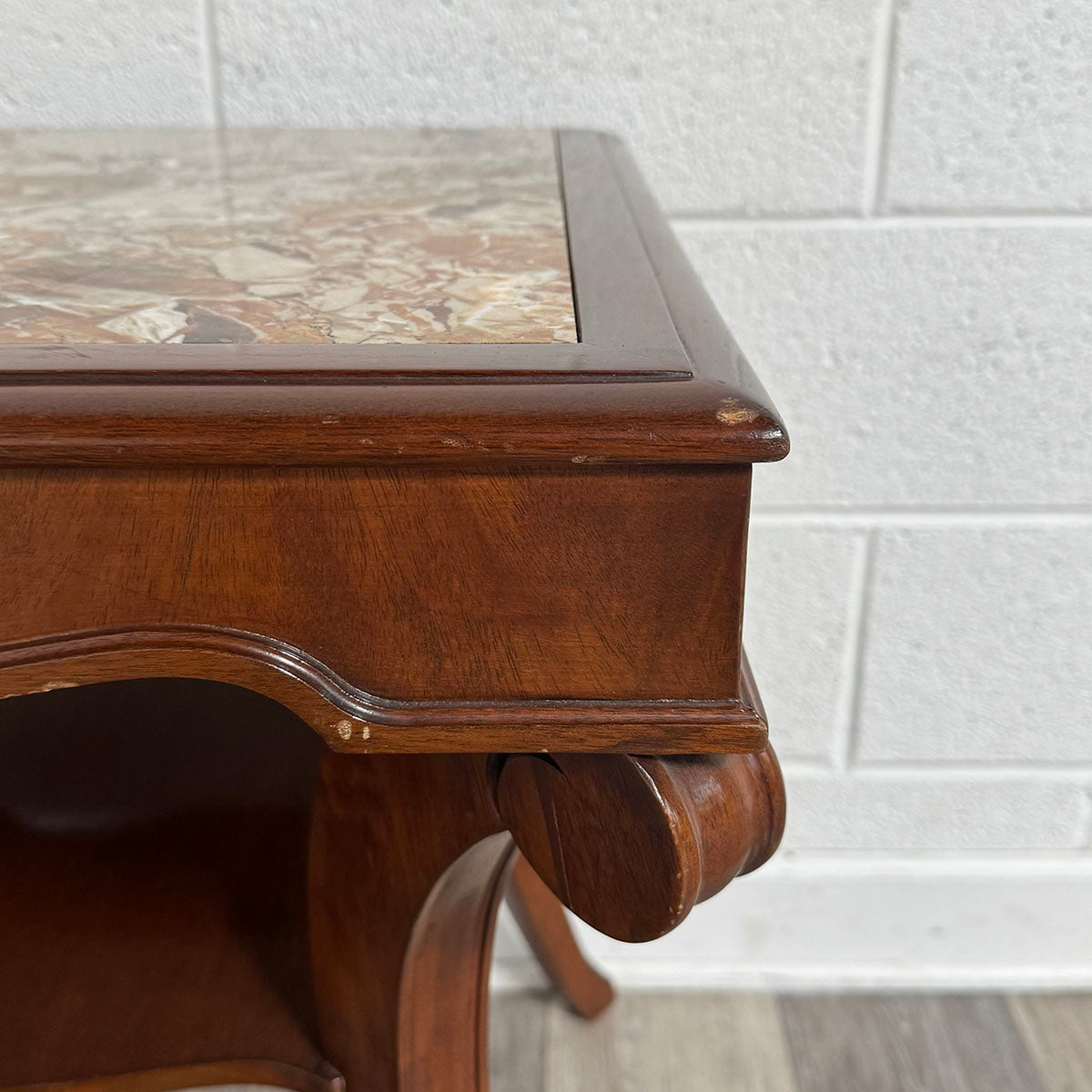 Pair of inlaid marble side tables