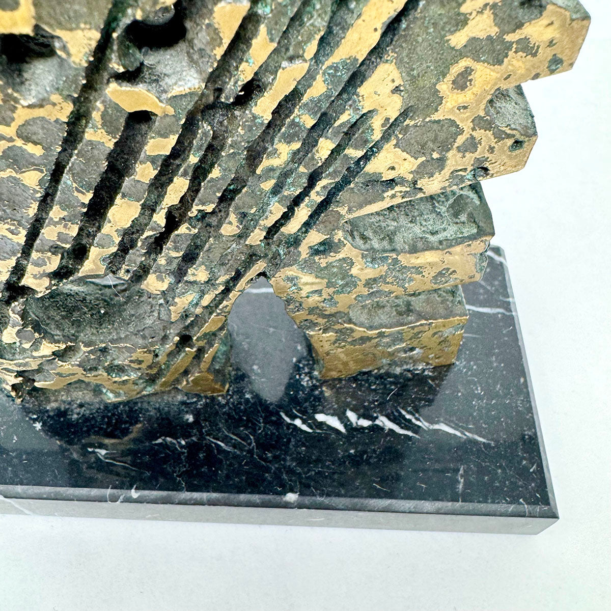 Brutalist Sculpture on a Marble Stand