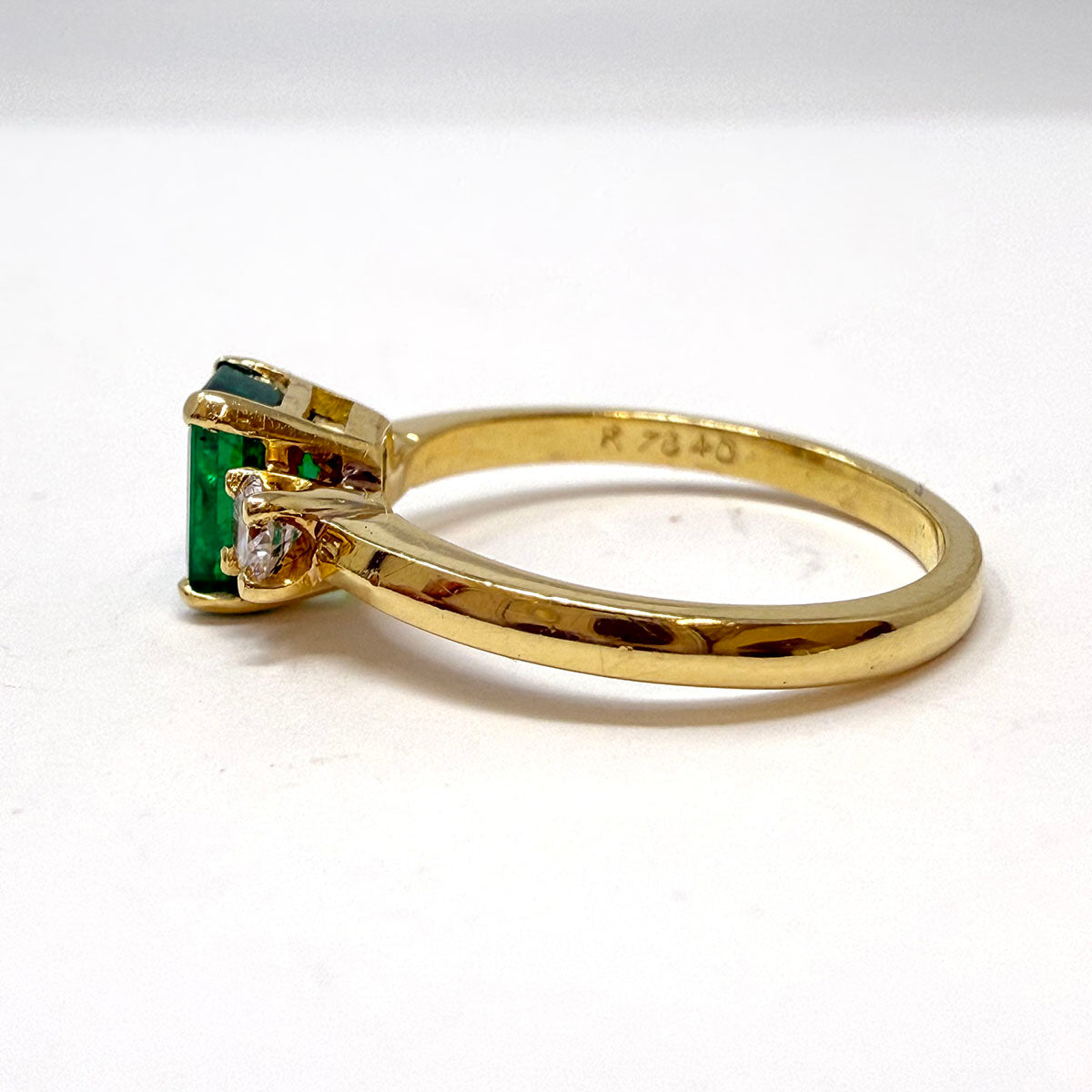 18K Gold Ring with Prong Set Emerald and 2 Diamonds