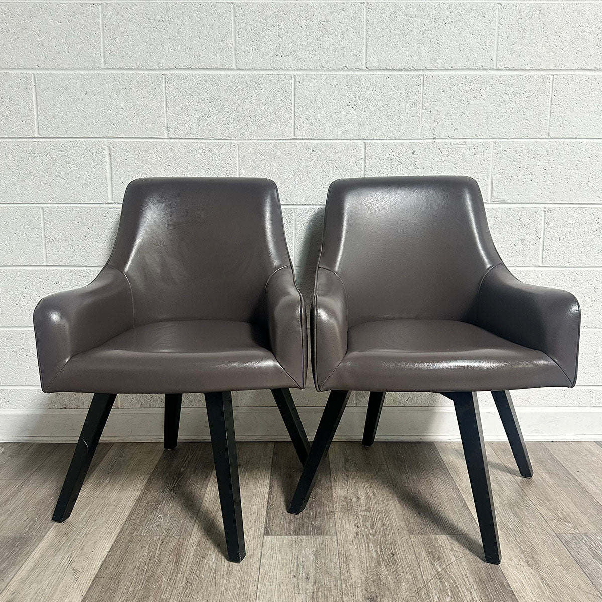 Pair of Brown Leather Swivel Chairs