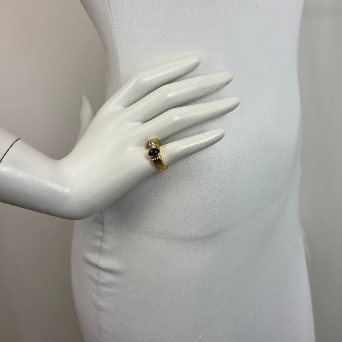 18K Ring with Oval Cabochon Sapphire and Diamonds