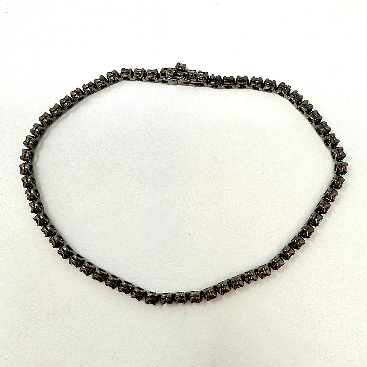 18K White Gold Tennis Bracelet with 51 Rubies and 10 Diamonds