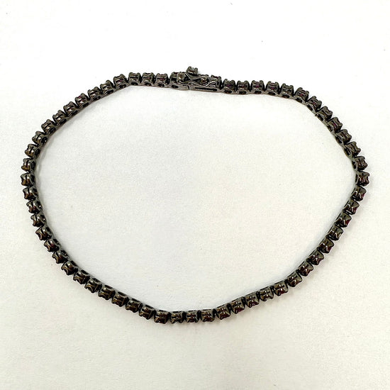 18K White Gold Tennis Bracelet with 51 Rubies and 10 Diamonds