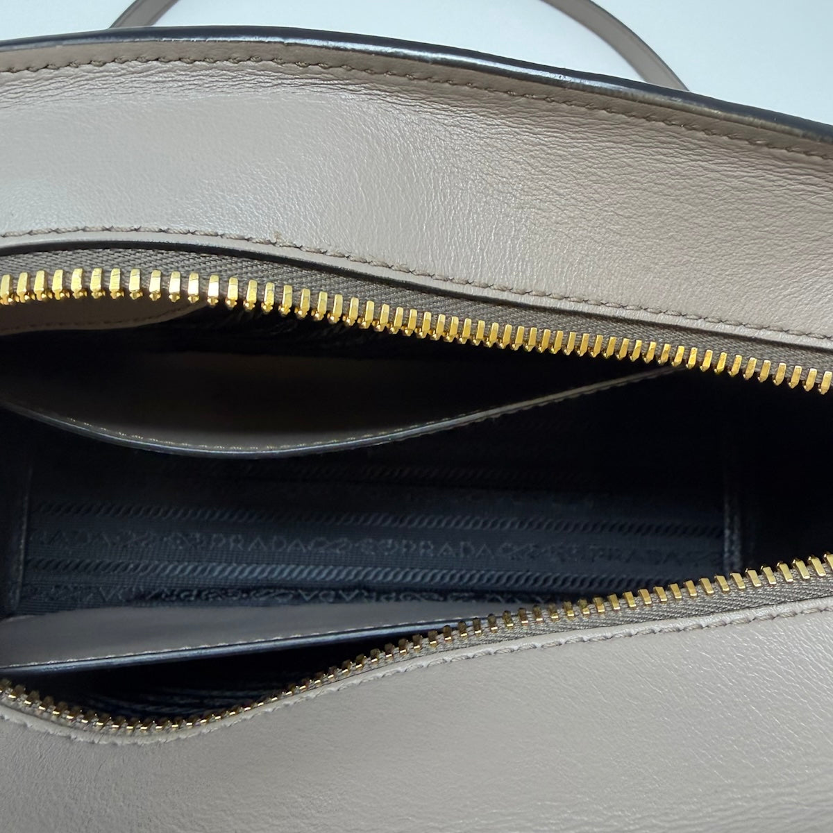 Prada Saffiano Leather Crossbody Bag with Zip Closure