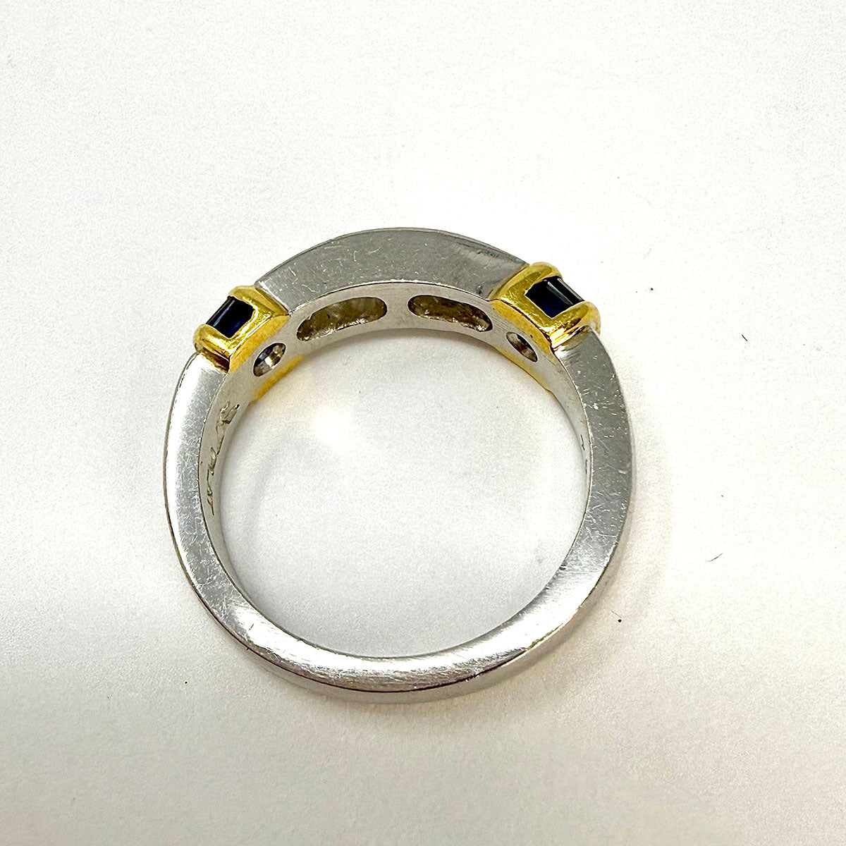 Platinum and 18K Gold Ring with 5 Diamonds and 18 Baguette Sapphires