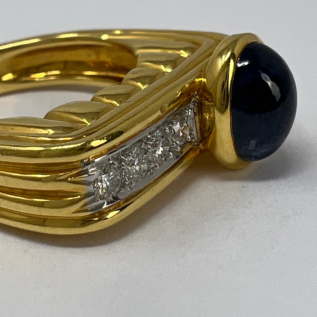 18K Ring with Oval Cabochon Sapphire and Diamonds