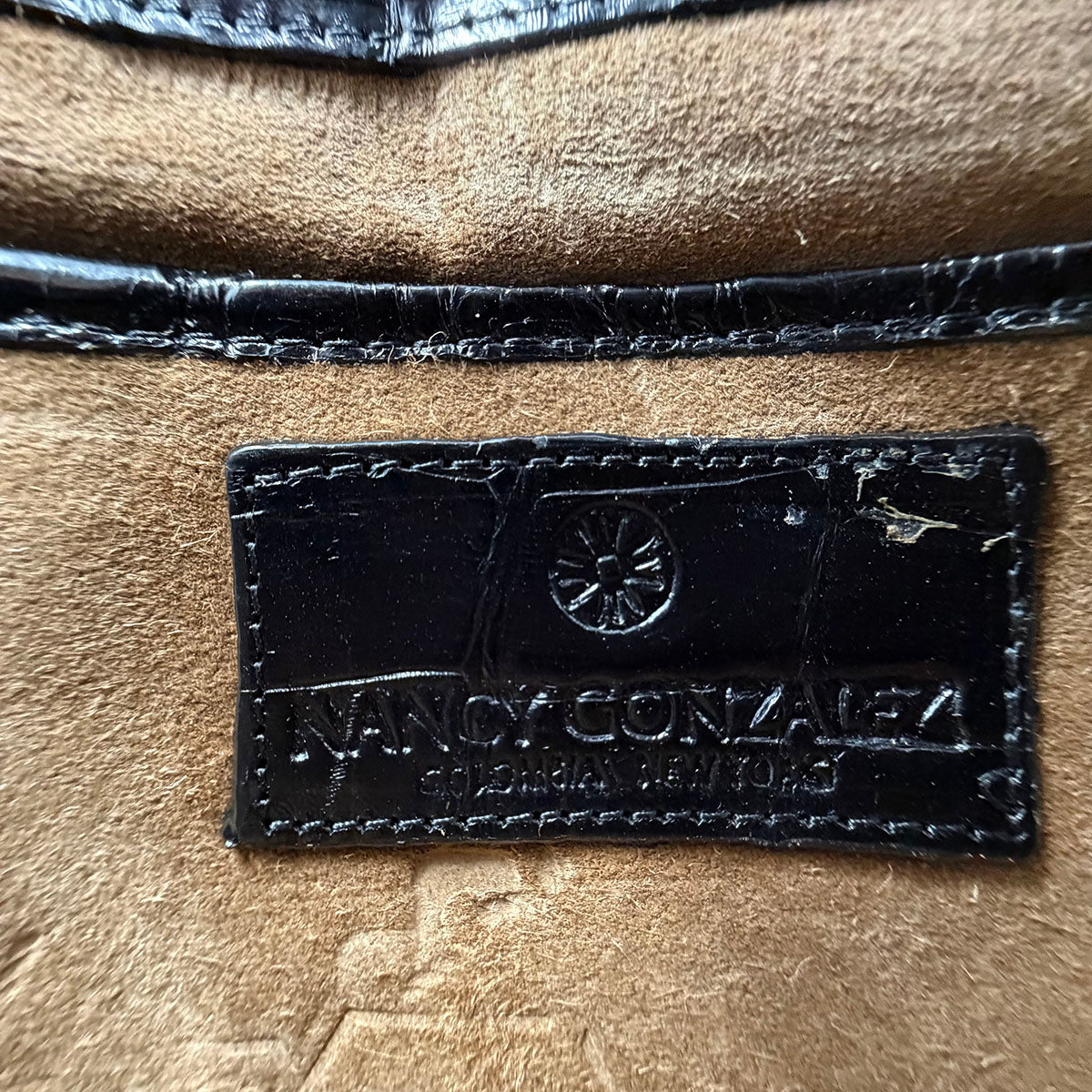 Nancy Gonzalez Clutch