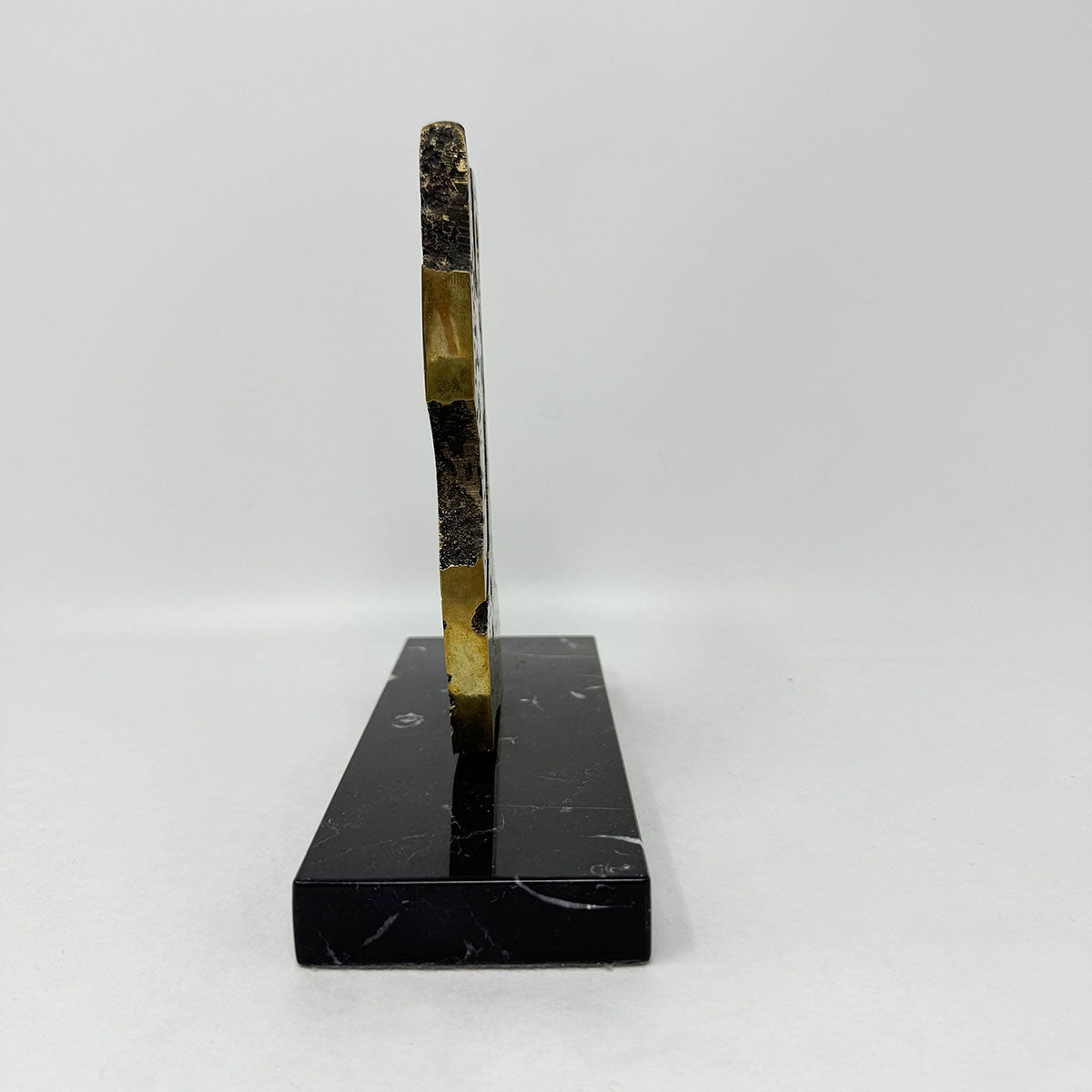 Brutalist Sculpture on a Marble Stand
