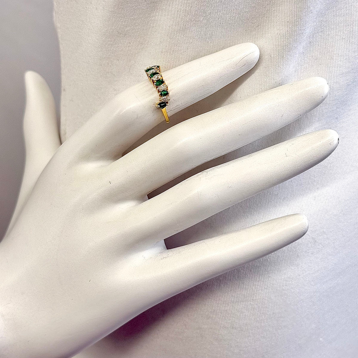 18K Gold Wavy Ring with 6 Emeralds and 5 Marquise Diamonds