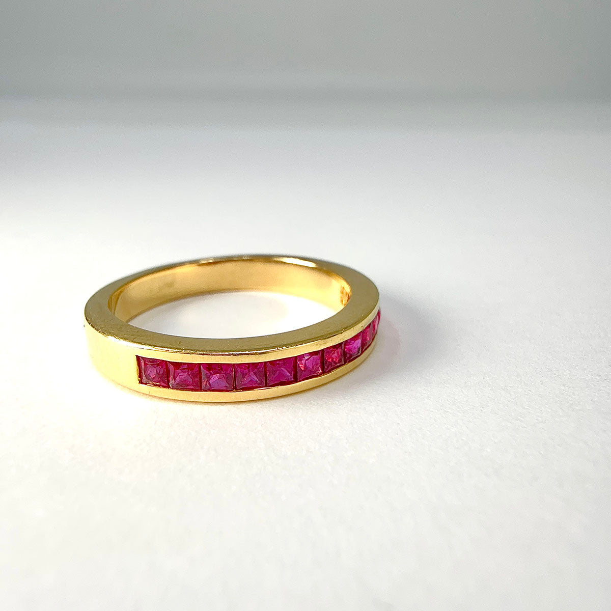 18K Gold Ring with 13 Channel Set Rubies