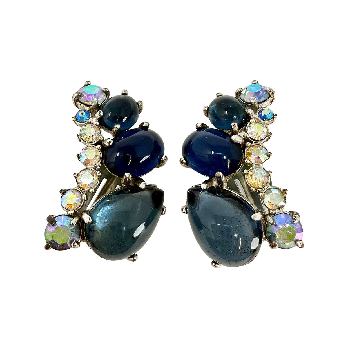 Signed Schiaparelli Curved Clip-on Earrings with Blue Rhinestones