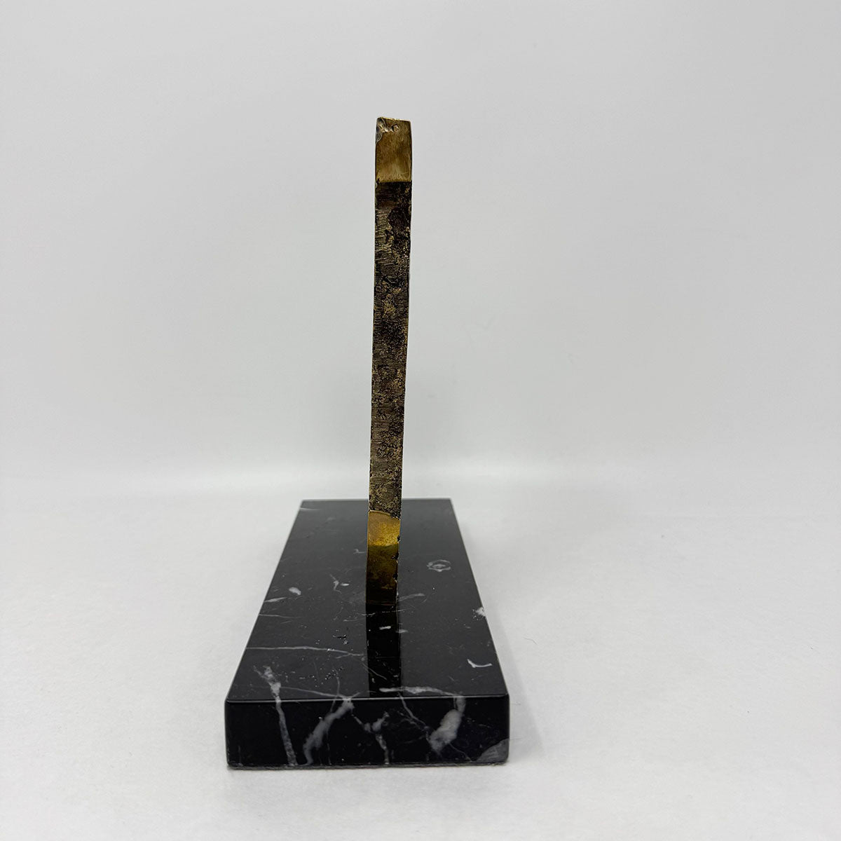 Brutalist Sculpture on a Marble Stand