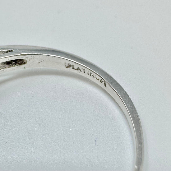 Platinum Ring with Sapphire and Diamonds