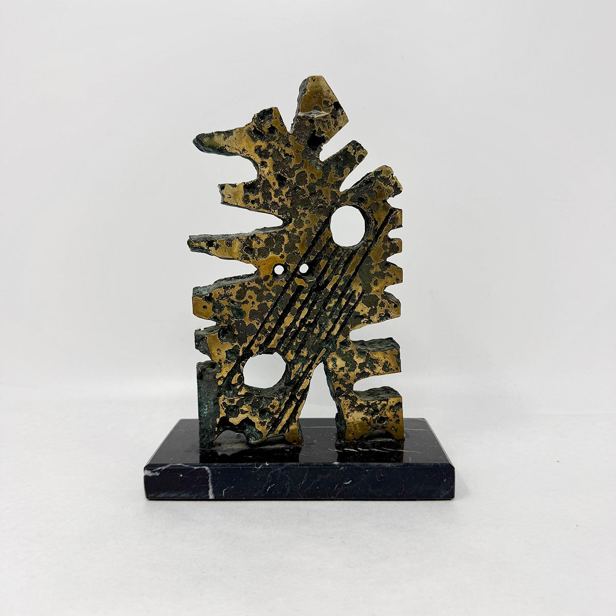 Brutalist Sculpture on a Marble Stand