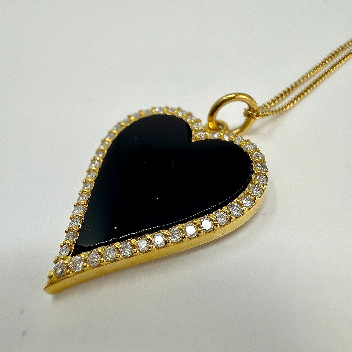 14K Gold Necklace with Black Onyx Heart Pendant with Diamond Trim