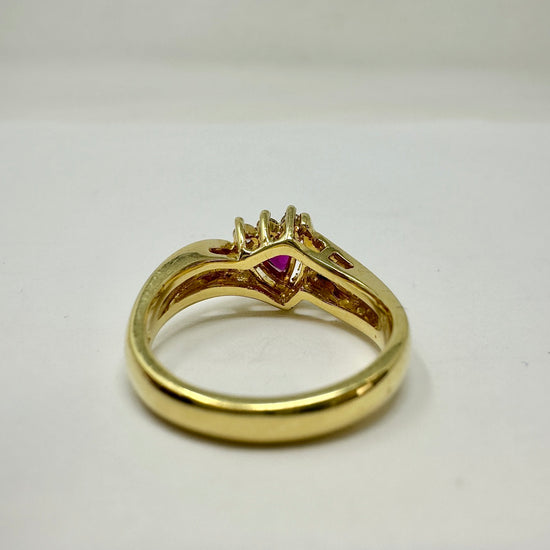 18K Gold Ring with Triangular Ruby and 3 Baguette Diamonds