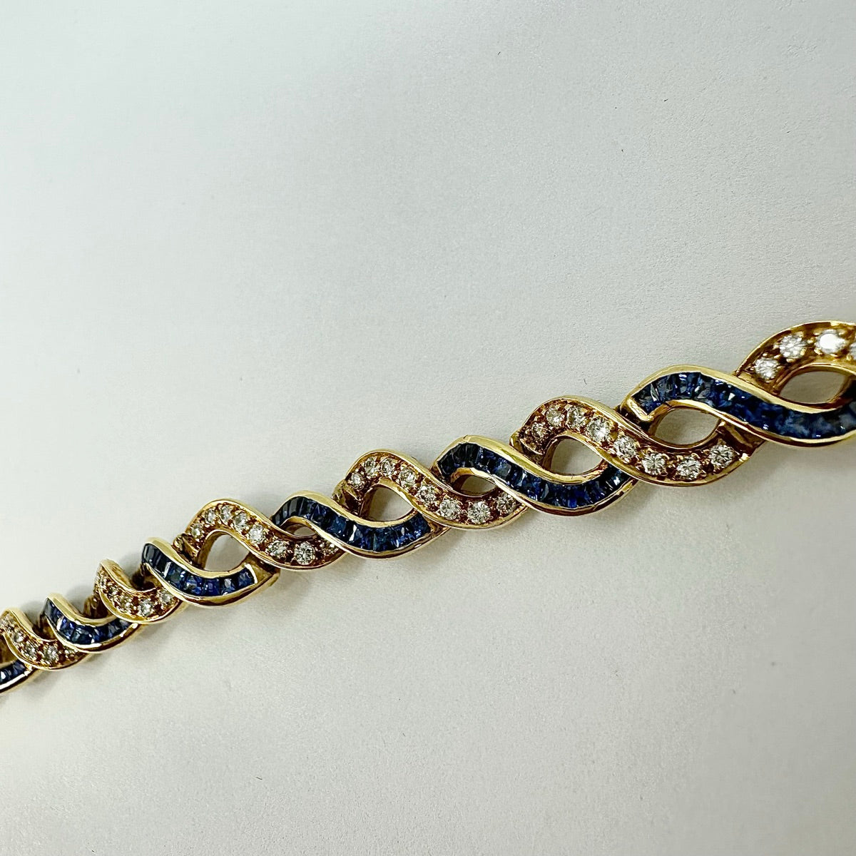18K Gold Twist 5.25ct Sapphire and 1.54ct. Diamond Tennis Bracelet