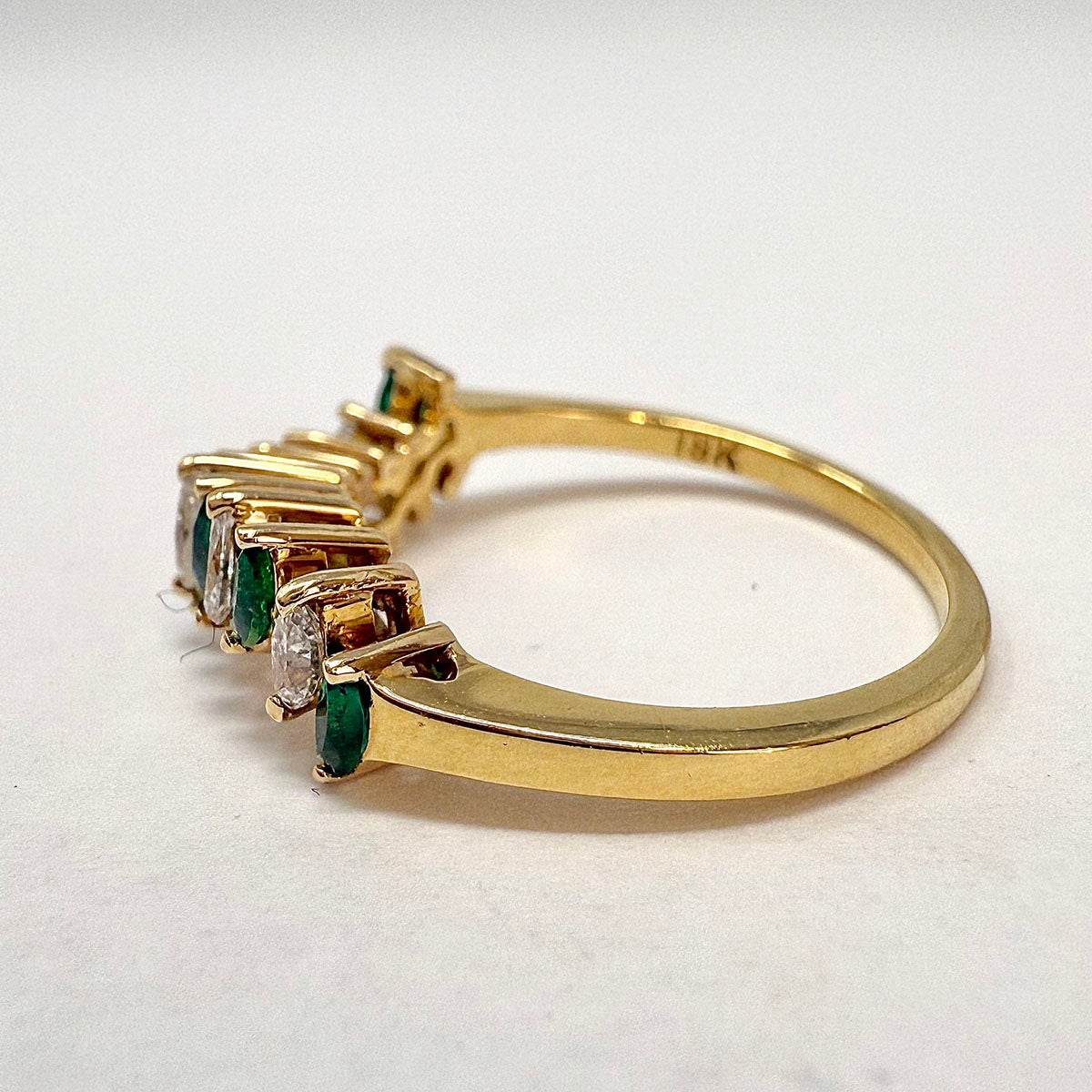 18K Gold Wavy Ring with 6 Emeralds and 5 Marquise Diamonds